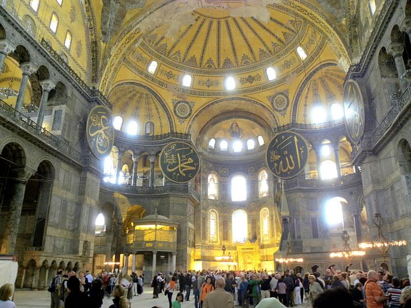 The exterior of Hagia Sophia in Istanbul, with its large central dome and minarets visible.