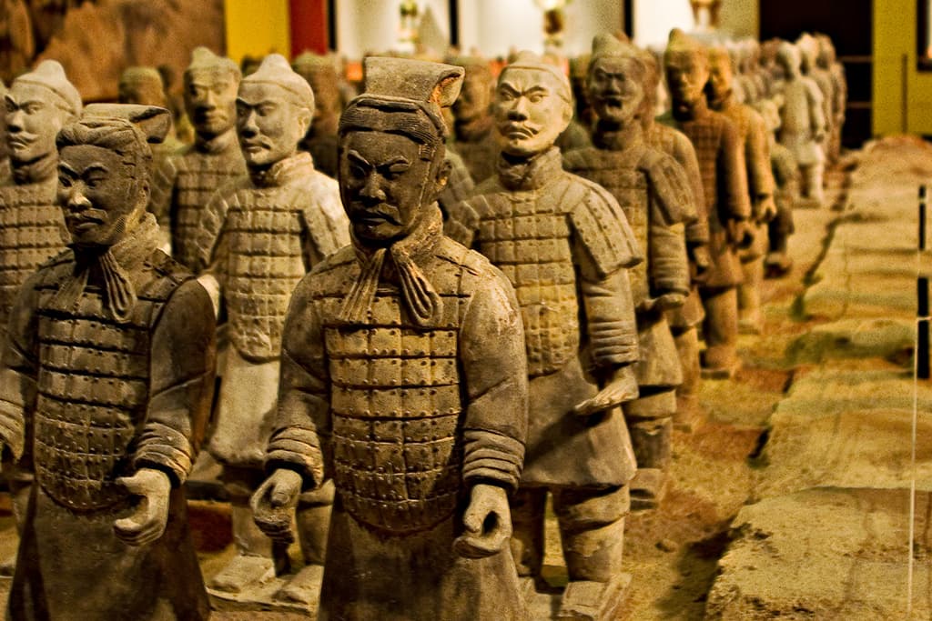 Rows of life-size terracotta warrior figures from Qin Shi Huang's mausoleum.